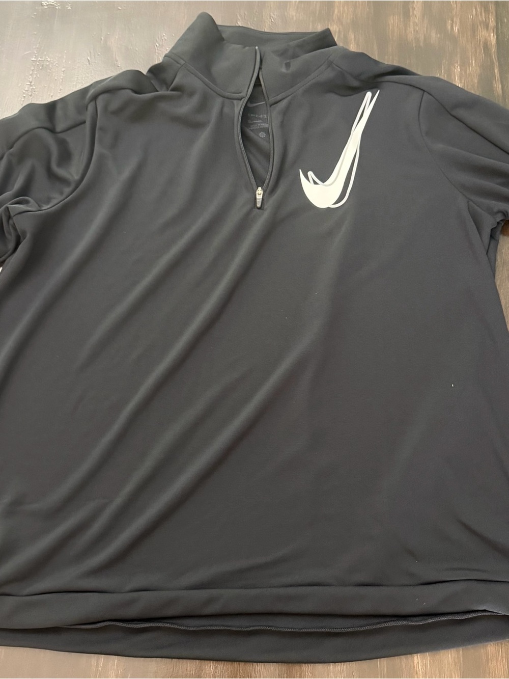 Nike Black Quarter-Zip Performance Pullover with White Swoosh Accent